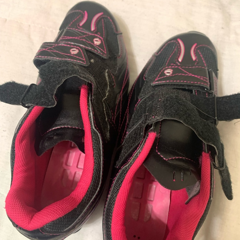 Pink cycling shoes with spd cleats